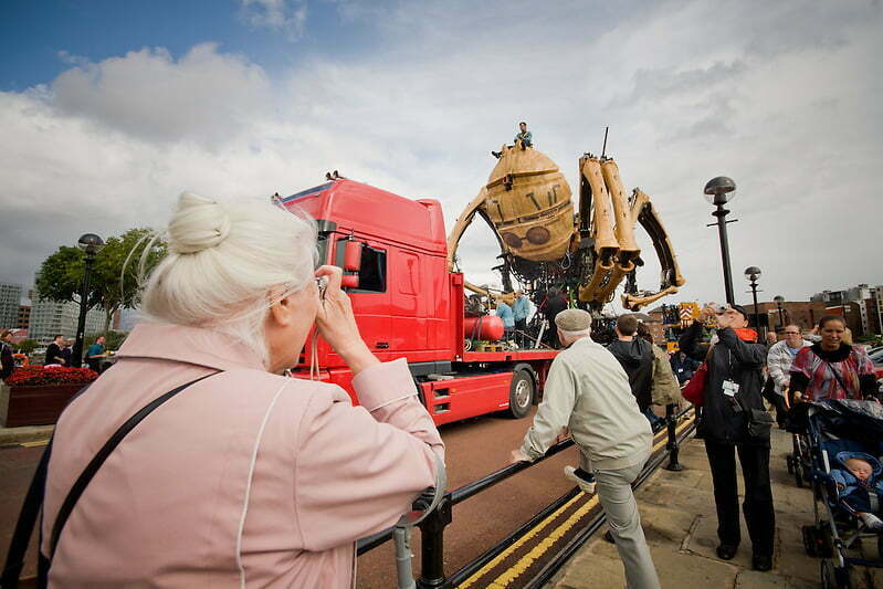 Thursday and La Princess is transported across the city to Albert Dock.  Everyone is looking out their office windows and taking to the streets to see the spider. (Pete Carr)