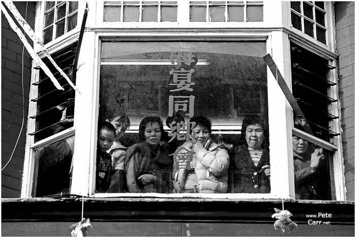People wait for the parade