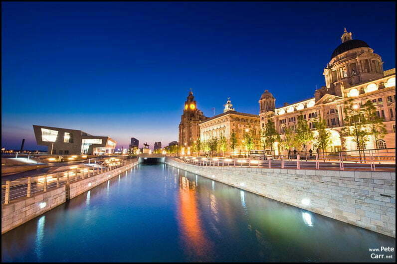3 Graces and ferry terminal at dusk